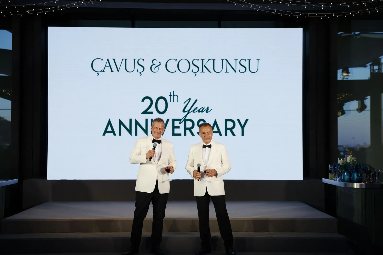 The founding partners on stage at the 20th anniversary celebration